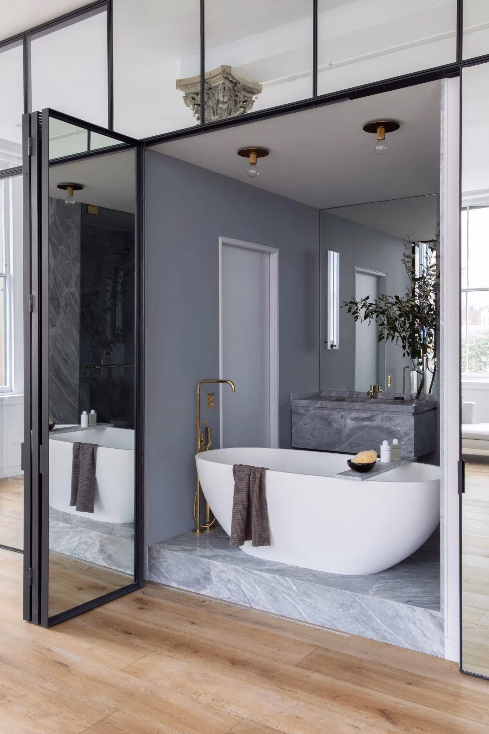 Serene Soaking: The Freestanding Bathtub in the Tribeca Loft Bathroom