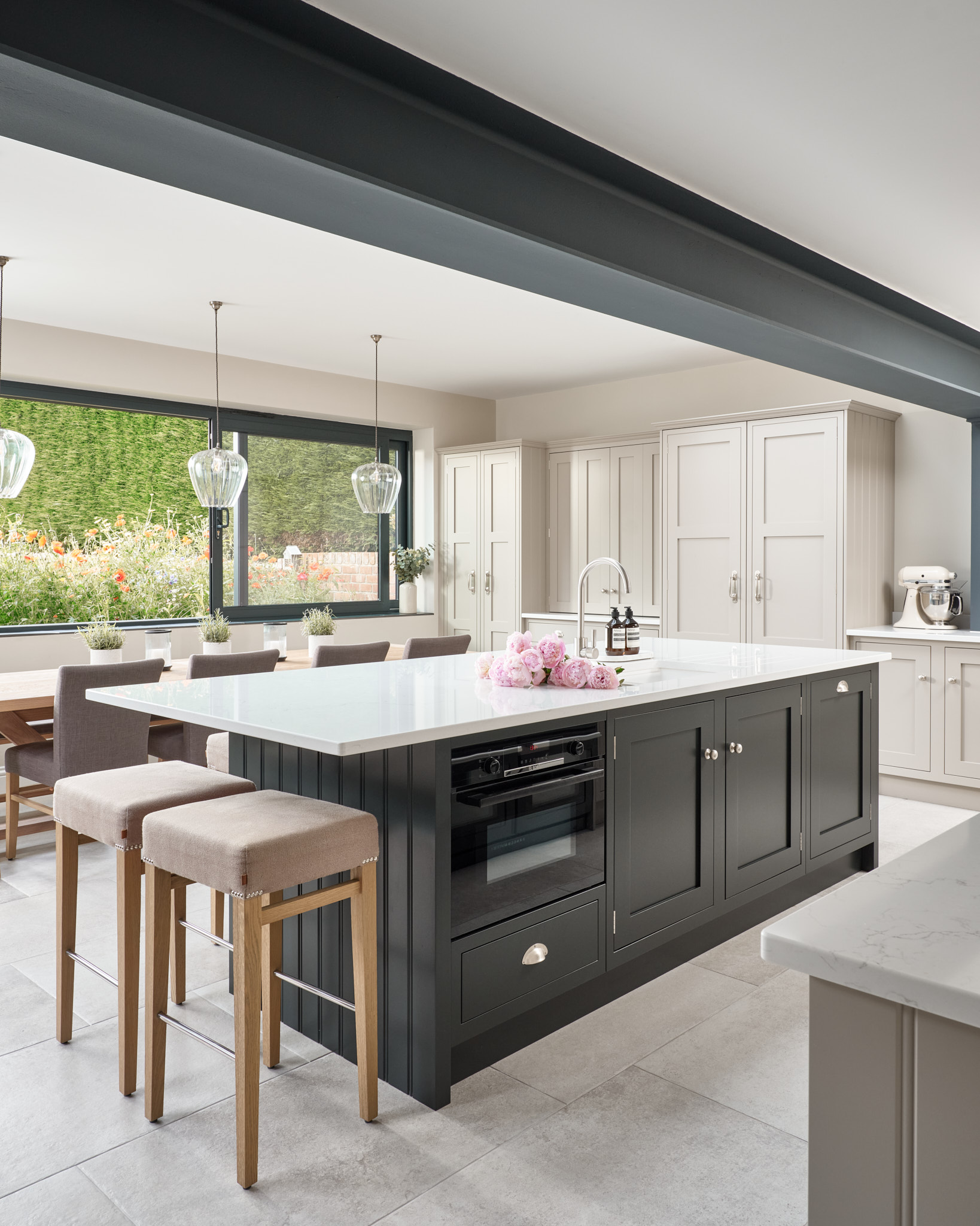 A bespoke kitchen island showcasing luxury countertop design and sophisticated functionality.