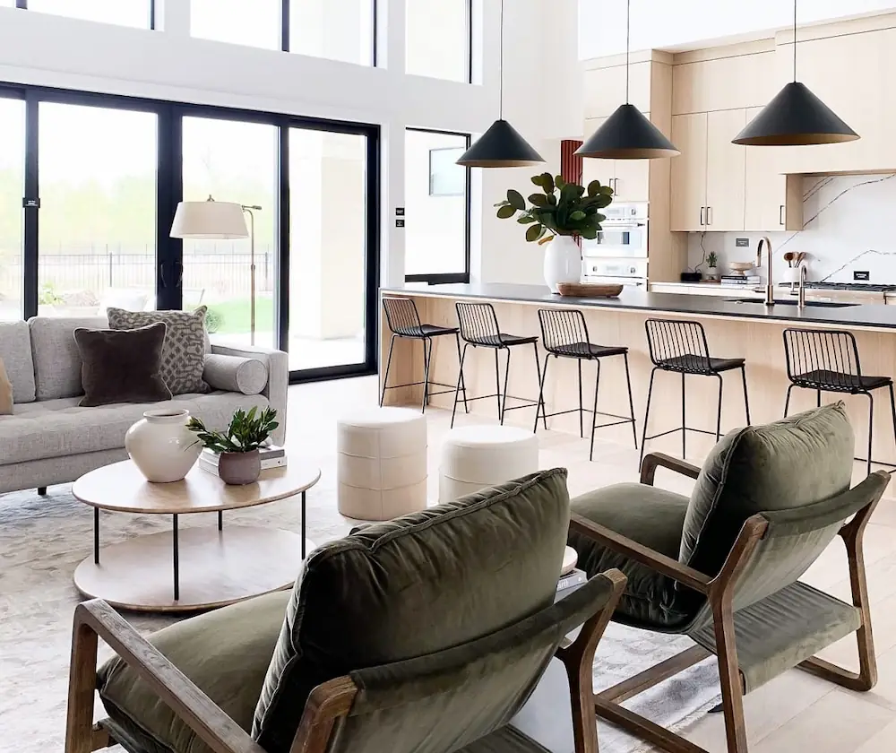 See how consistent color schemes and materials contribute to a visually cohesive open concept space, enhancing both style and flow.