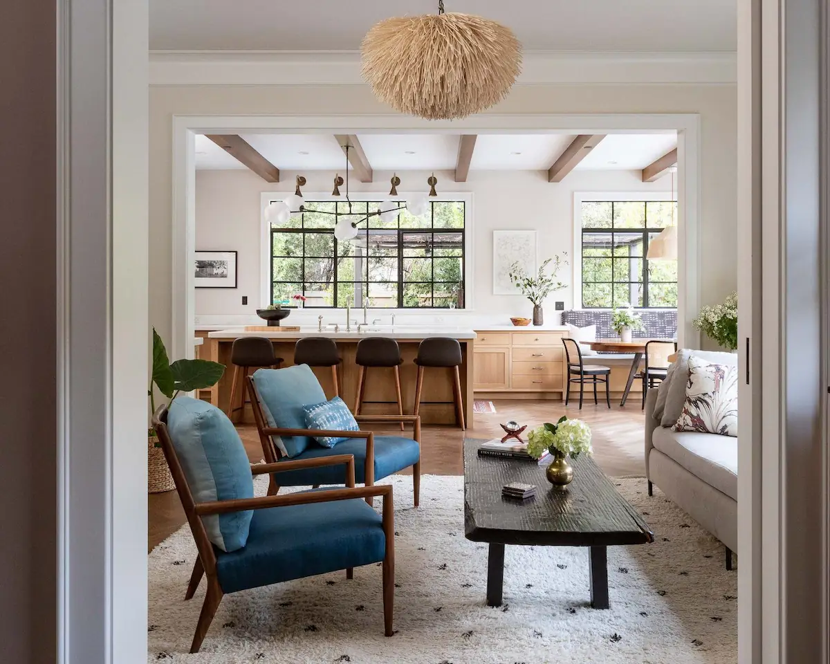 Experience the expansive feel of an open concept living and dining area, where light and space meet to create a harmonious environment.