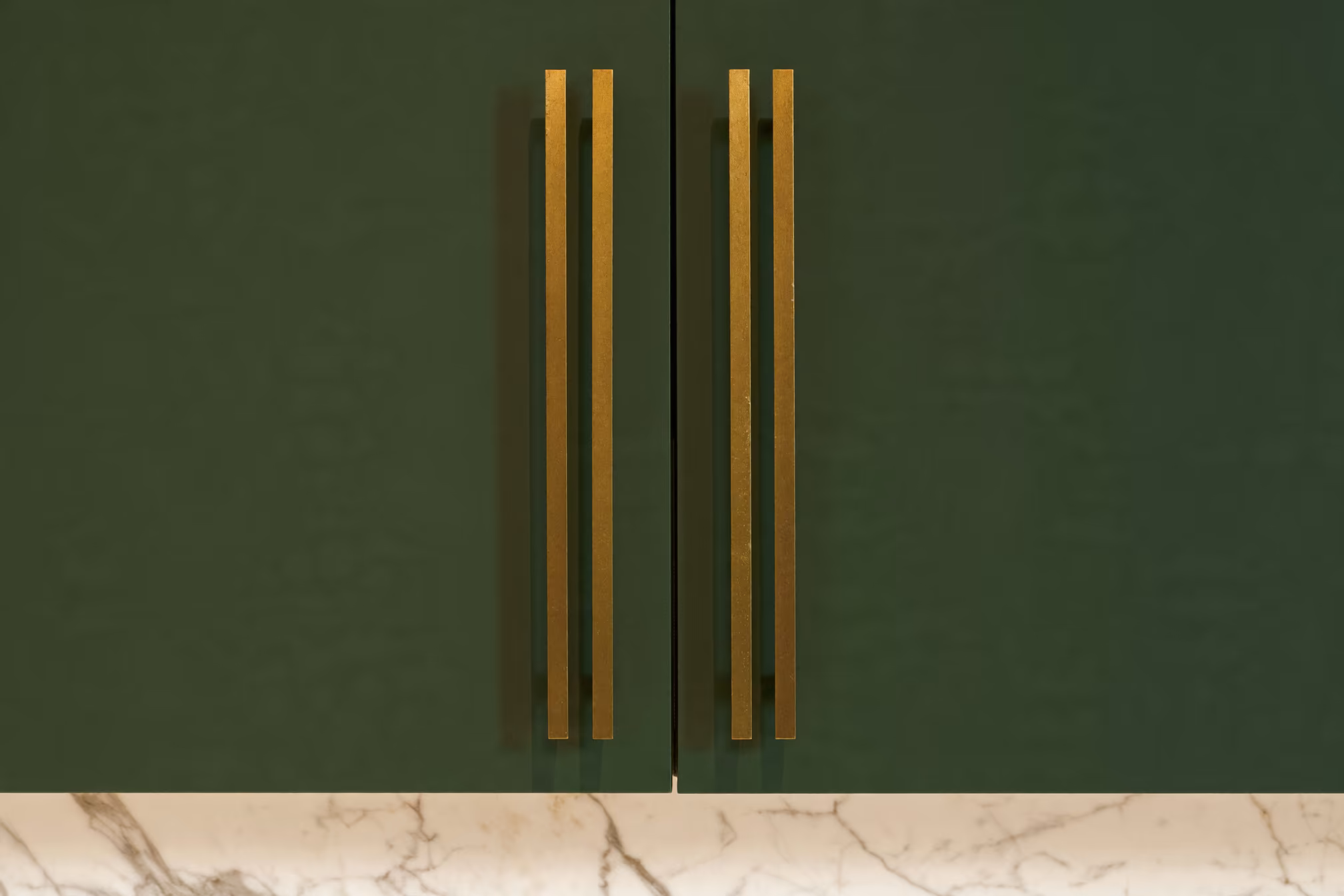 custom green kitchen cabinets matte lacquer brass hardware nyc millwork